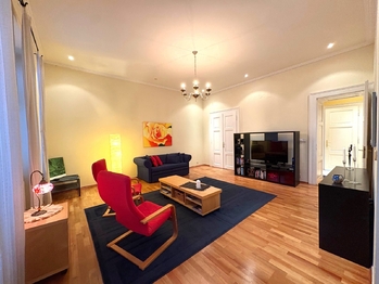 Obývací pokoj - Prodej bytu 2+1 v osobním vlastnictví 76 m², Praha 5 - Smíchov