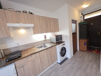 kuchynská link a vchod - Pronájem bytu 1+kk v osobním vlastnictví 27 m², Brno