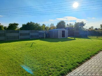 Zahrada u domu.  - Pronájem bytu 2+kk v osobním vlastnictví 63 m², Čelákovice
