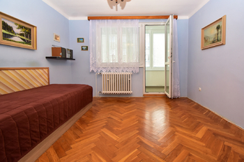 Ložnice s lodžií.  - Prodej bytu 3+1 v osobním vlastnictví 75 m², Brandýs nad Labem-Stará Boleslav