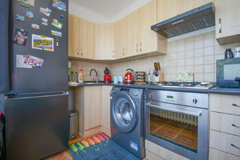 kuchyň - Prodej bytu 1+1 v osobním vlastnictví 34 m², Hradec Králové