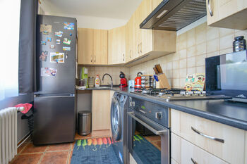 kuchyň - Prodej bytu 1+1 v osobním vlastnictví 34 m², Hradec Králové