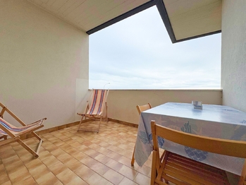 vstup na terasu z kuchyně  - Prodej bytu 2+kk v osobním vlastnictví 53 m², Silvi