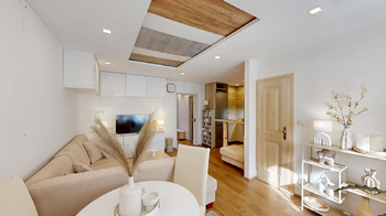 obývací pokoj s kuchyňským koutem a lodžií - Prodej bytu 4+kk v družstevním vlastnictví 72 m², Praha 4 - Michle