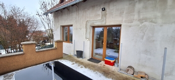 Pohled na dům z terasy - Prodej domu 137 m², Jedovnice