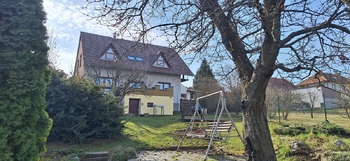 Pohled na dům ze zahrady - Prodej domu 137 m², Jedovnice