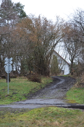 Příjezdová nezpevněná cesta - Prodej pozemku 1706 m², Hrubá Skála