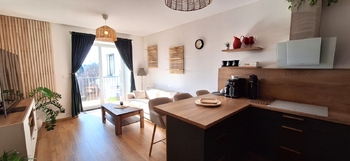 Obývací pokoj s kuchyňským koutem - Prodej bytu 2+kk v osobním vlastnictví 49 m², Rostěnice-Zvonovice