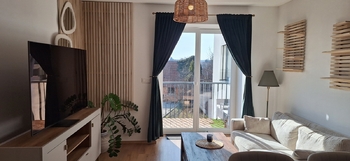 Obývací pokoj s kuchyňským koutem - Prodej bytu 2+kk v osobním vlastnictví 49 m², Rostěnice-Zvonovice