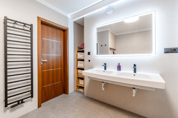 Koupelna - Prodej bytu 3+kk v osobním vlastnictví 110 m², Praha 10 - Vršovice