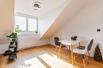 Jídelní část - Prodej bytu 3+kk v osobním vlastnictví 110 m², Praha 10 - Vršovice