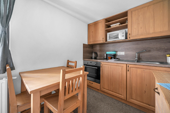 Kuchyňský kout - Prodej bytu 1+kk v osobním vlastnictví 37 m², Pec pod Sněžkou