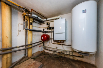 47. Technická místnost v 1. PP domu - Prodej domu 229 m², Praha 6 - Řepy