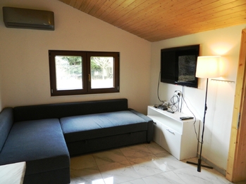 Obývací pokoj. - Prodej chaty / chalupy 65 m², Chotoviny