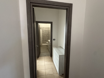 Chodba vedoucí do ložnice a koupelny - Prodej bytu 2+kk v osobním vlastnictví 57 m², Silvi