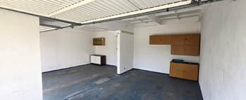 Prodej garáže, Postoloprty