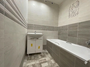 Koupelna - Prodej bytu 3+kk v osobním vlastnictví 82 m², Žatec