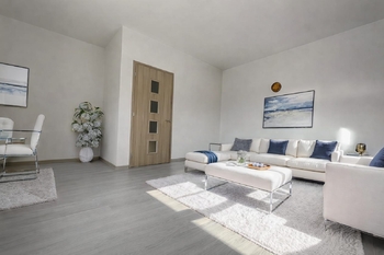 Obývací pokoj - Prodej bytu 2+1 v osobním vlastnictví 85 m², Žatec