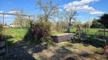 Vrtaná studna u chatky, zásobník na vodu - Pronájem pozemku 1499 m², Přerov