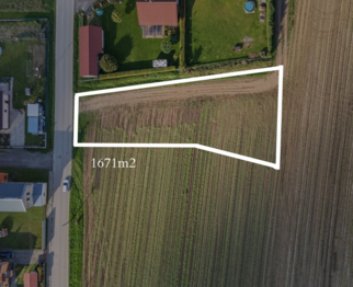 Prodej pozemku 1671 m², Všestary