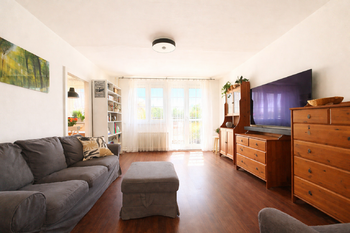 Obývací pokoj - Prodej bytu 3+1 v osobním vlastnictví 89 m², Praha 6 - Řepy 