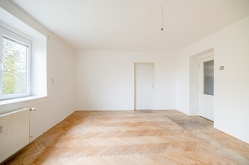 Obývací pokoj - Prodej bytu 2+1 v osobním vlastnictví 58 m², Praha 6 - Dejvice