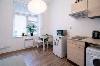 Část ( 1+1 )  - Kuchyň - Prodej bytu 3+1 v osobním vlastnictví 89 m², Praha 3 - Žižkov