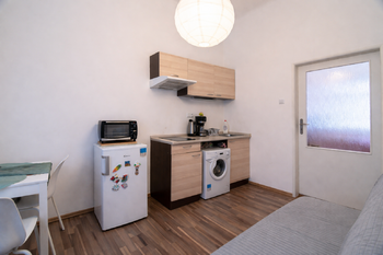 Část ( 1+1 )  - Kuchyň - Prodej bytu 3+1 v osobním vlastnictví 89 m², Praha 3 - Žižkov