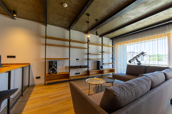 Obývací pokoj - Prodej bytu 4+kk v osobním vlastnictví 115 m², Praha 9 - Vysočany