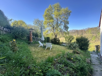 Posezení vedle domu - Prodej domu 45 m², Niměřice