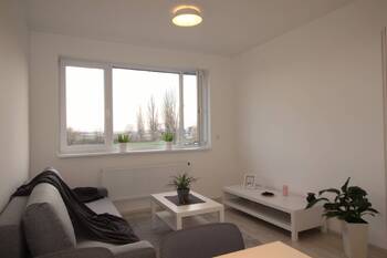 Obývací část - Pronájem bytu 1+kk v osobním vlastnictví 27 m², Pohořelice