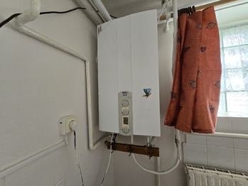 Plynový kotel - Prodej domu 180 m², Měcholupy