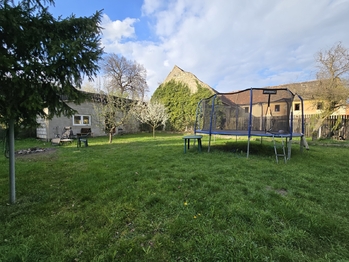 Zahrada za domem - Prodej domu 180 m², Měcholupy