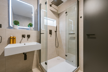 KOUPELNA - Pronájem bytu 1+kk v osobním vlastnictví 37 m², Praha 6 - Břevnov
