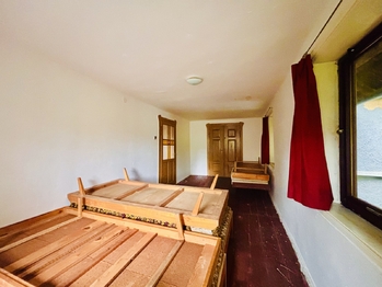 Pokoj 1.NP - Prodej domu 260 m², Brniště