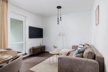 Obývací pokoj - Prodej bytu 3+kk v osobním vlastnictví 40 m², Praha 8 - Kobylisy