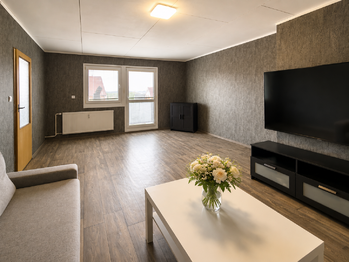Obývací pokoj - Prodej bytu 3+1 v osobním vlastnictví 75 m², Trhové Sviny