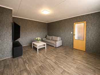 Obývací pokoj - Prodej bytu 3+1 v osobním vlastnictví 75 m², Trhové Sviny