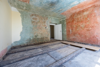 Obývací pokoj - Prodej nájemního domu 221 m², Praha 6 - Řepy