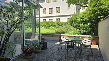 Společné prostory na zahradě domu - Pronájem kancelářských prostor 58 m², Brno