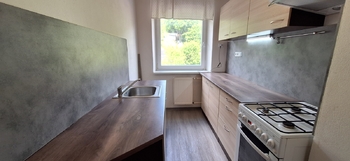 Kuchyně v 1. patře - Prodej domu 178 m², Zlín