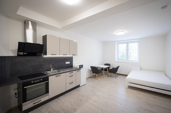 Obývací pokoj s jídelnou - Pronájem bytu 1+kk v osobním vlastnictví 28 m², Brno