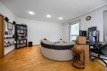 Obývací pokoj - Prodej bytu 3+kk v osobním vlastnictví 83 m², Praha 10 - Vinohrady
