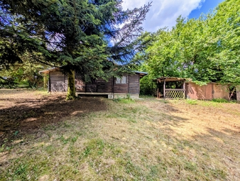 s posezením a dřevníky ... - Prodej pozemku 1590 m², Herálec