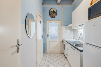 Kuchyň - Prodej bytu 1+1 v družstevním vlastnictví 39 m², Praha 9 - Vysočany