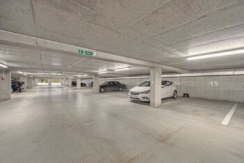 garážové stání - Pronájem bytu 2+kk v osobním vlastnictví 46 m², Zbuzany