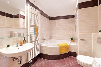 Koupelna. - Prodej bytu 2+kk v osobním vlastnictví 65 m², Praha 9 - Letňany