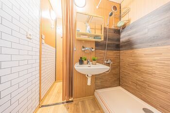 koupelna - Prodej bytu 1+kk v družstevním vlastnictví 25 m², Praha 4 - Kamýk