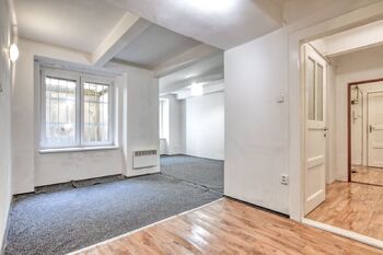 Místnost s kuchyňským koutem - Prodej bytu 2+kk v osobním vlastnictví 57 m², Praha 3 - Žižkov