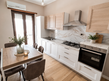 kuchyň se vstupem na terasu  - Prodej bytu 2+1 v osobním vlastnictví 64 m², Montesilvano